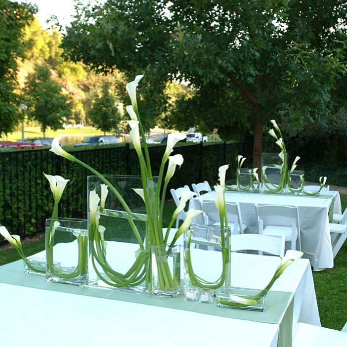 Calla lily centerpieces for an outdoor reception