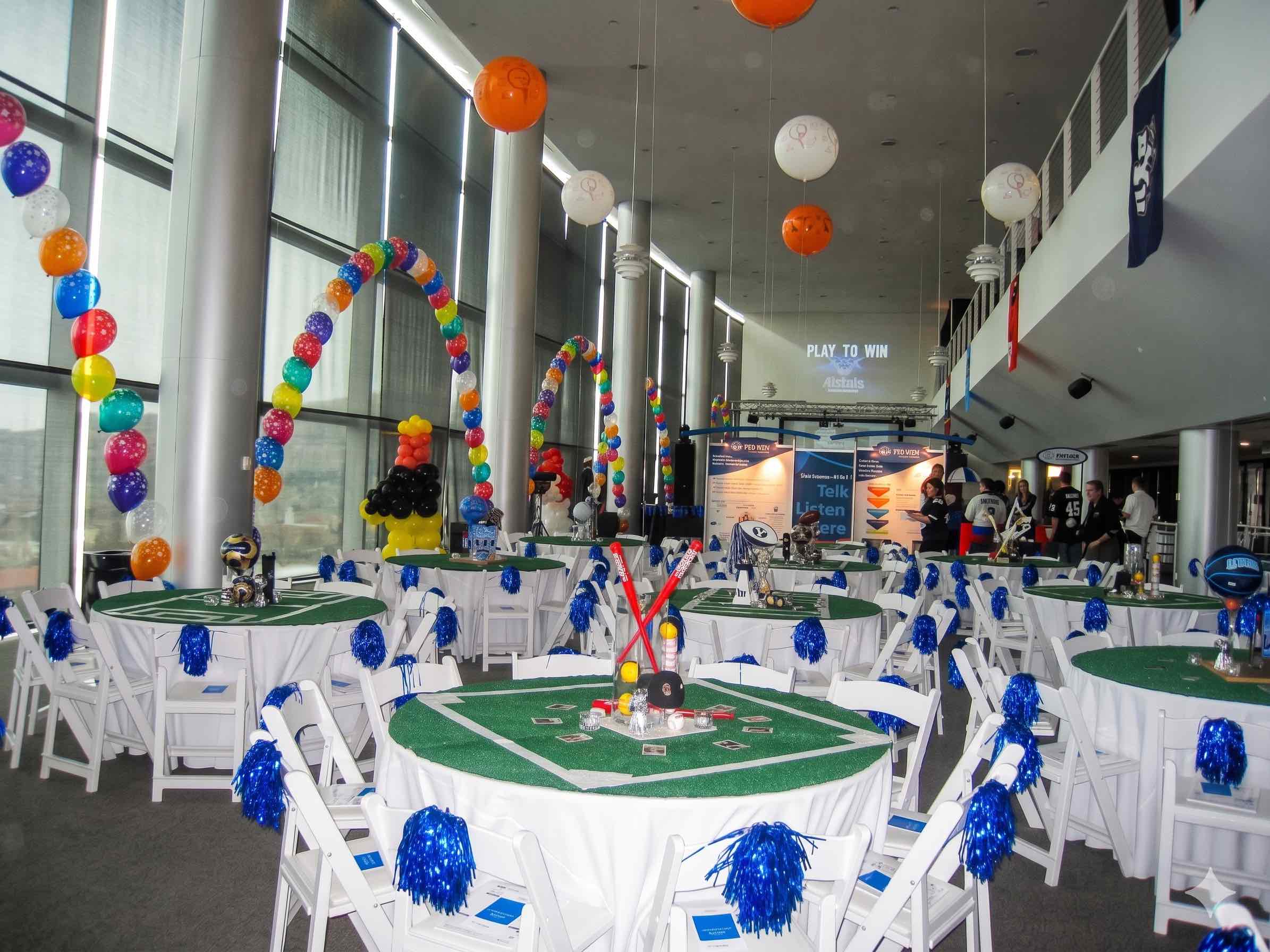 Sports-themed ballroom with balloon arches