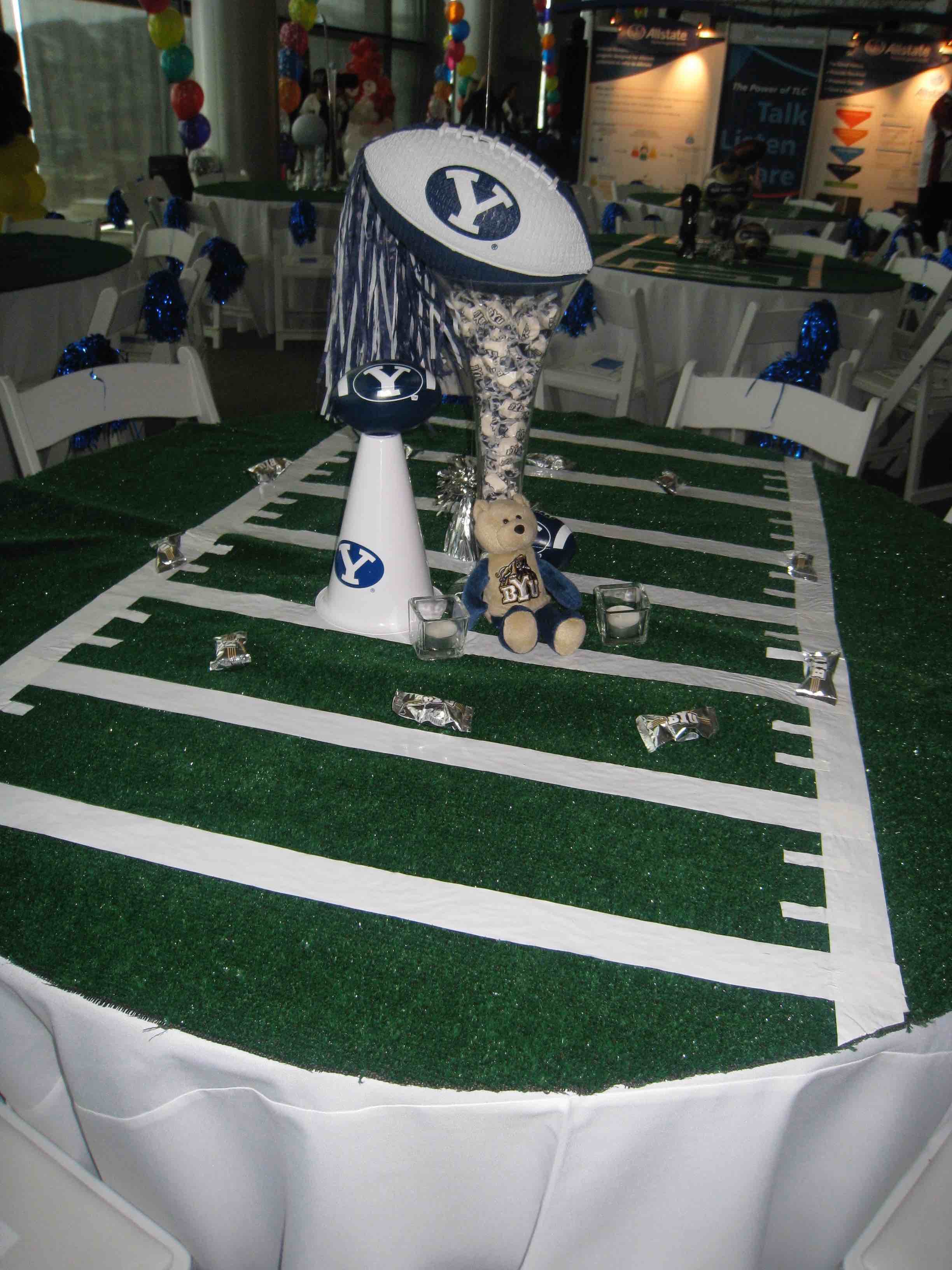 BYU football field centerpiece with team keepsakes